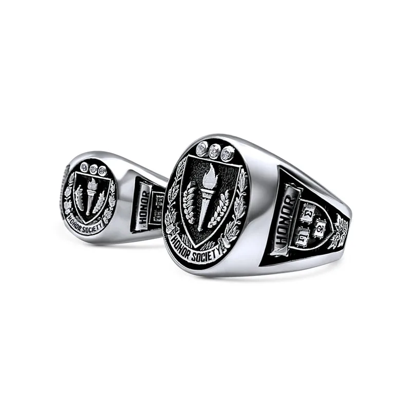 Two sterling silver Honor Society Class Rings, each oval face bearing the torch-and-wreath crest