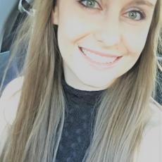 Portrait of Amber Kujaczynski