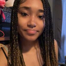 Portrait of Iysiss Kelly